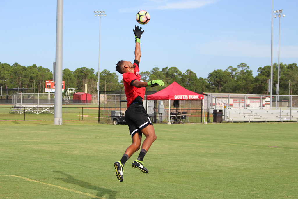 Sidi jumping to make a one-handed save